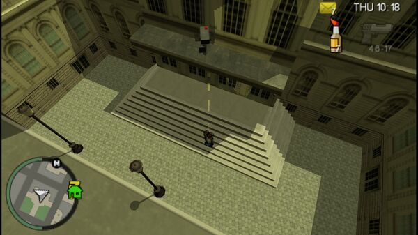 Местоположение камеры безопасности №15 для уничтожения в GTA Chinatown Wars, находится у входа в Гражданскую цитадель в здании мэрии.