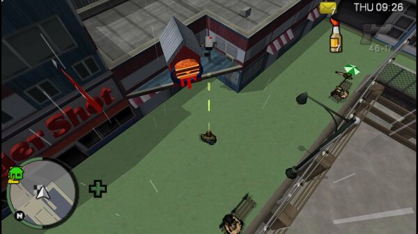 Местоположение камеры безопасности №18 для уничтожения в GTA Chinatown Wars, находится у входа в Burger Shot в Castle Garden City.