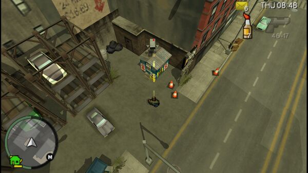 Расположение камеры наблюдения №28 для уничтожения в GTA Chinatown Wars, находится на маленьком здании рядом с парковкой.