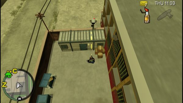 Место расположения камеры наблюдения №69 в GTA Chinatown Wars, которую нужно уничтожить, находится на контейнере во дворе в Стайнвее.