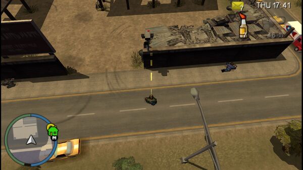 Местоположение камеры безопасности №96 в GTA Chinatown Wars для уничтожения, находится у входа в Hairy Al's Scrap and Auto Parts в Firefly Projects.