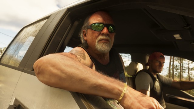 Скриншот из GTA VI с Брайаном и Джейсоном в машине, Брайан смотрит в окно в солнечных очках